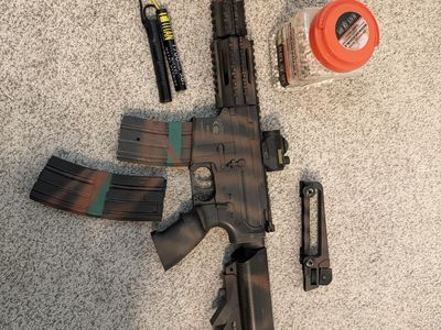Black Ops Airsoft Rifle with Custom Paint, Scope, Titan 9.6V Battery, and BBs