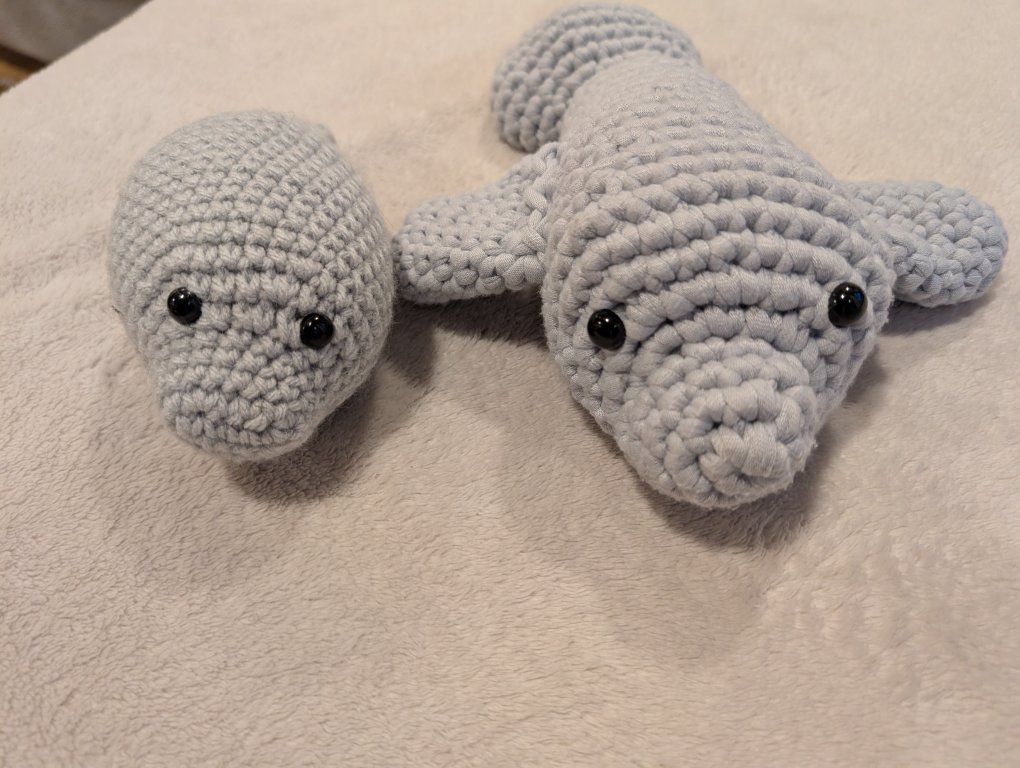 Two Hand Knitted Chunky Manatees