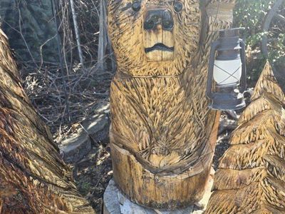 Chainsaw-carved Bear (holding lantern)