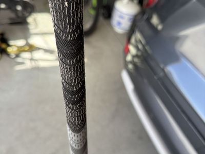 Golf club regripping