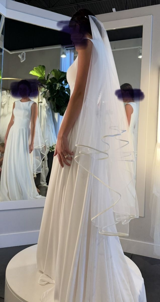 White Sleeveless A-Line Wedding Dress with Button Back - New, Size 4