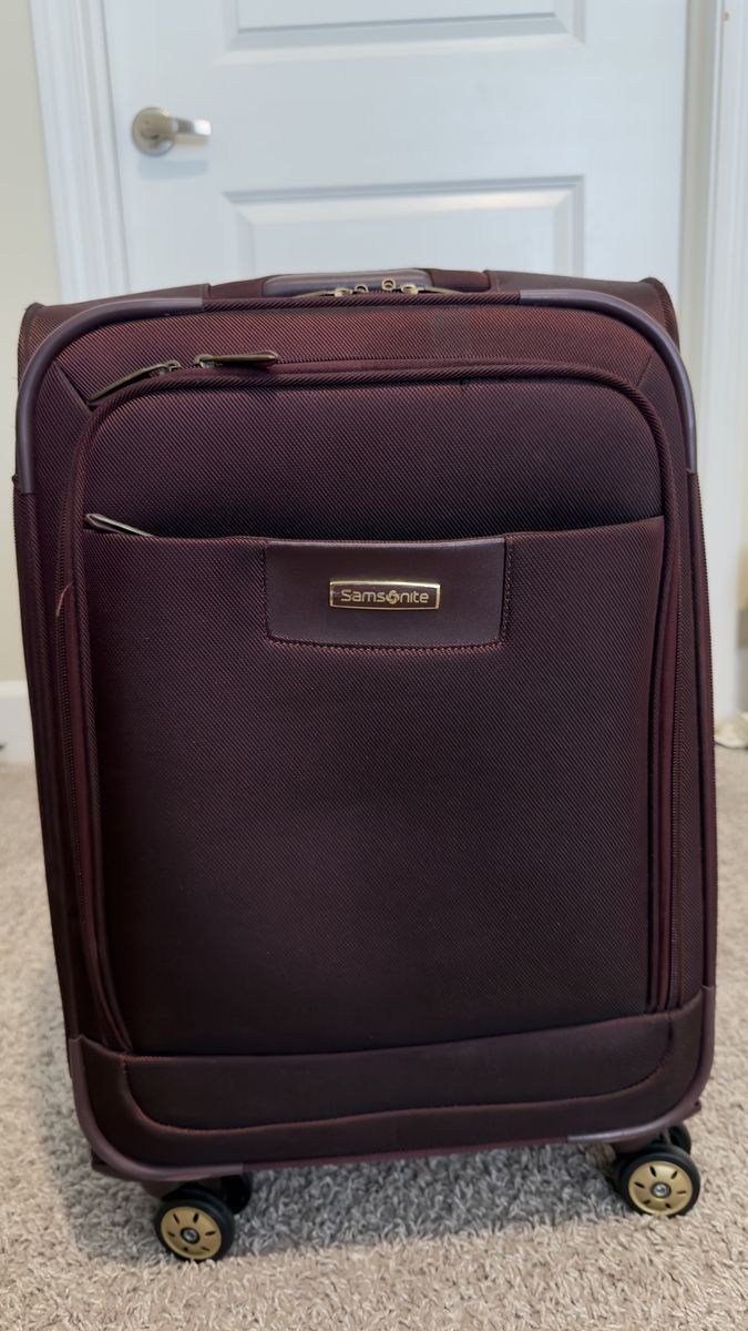 Samsonite Tru-Trac 21" Spinner Carry-On Luggage in Plum - Burgundy Softside Suitcase