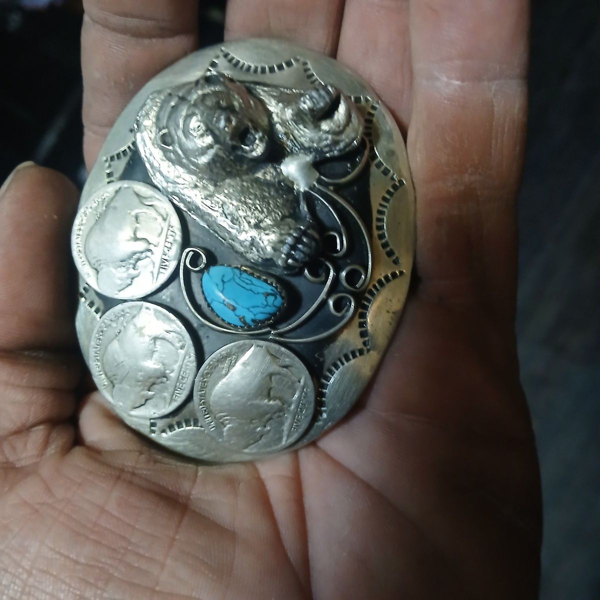 silver and turquoise belt buckle
