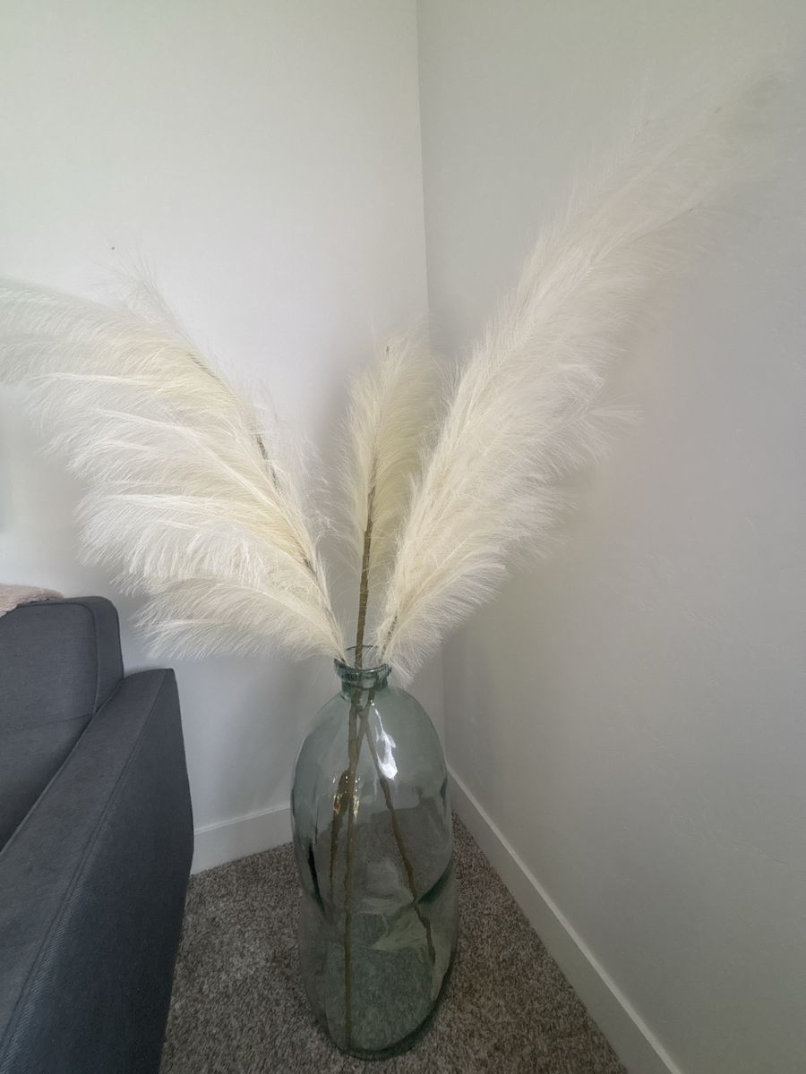 Glass floor vase with faux pampass grass