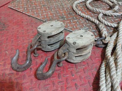 Antique block and tackle. Farm equipment item.