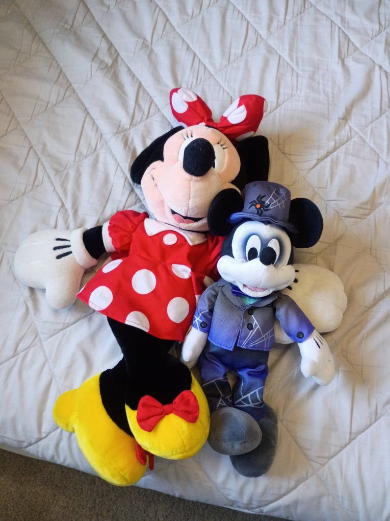 Mickey mouse Halloween and a larger Minnie stuffies