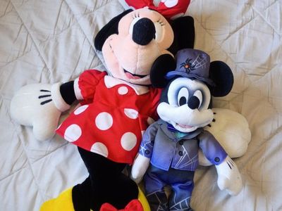Mickey mouse Halloween and a larger Minnie stuffies