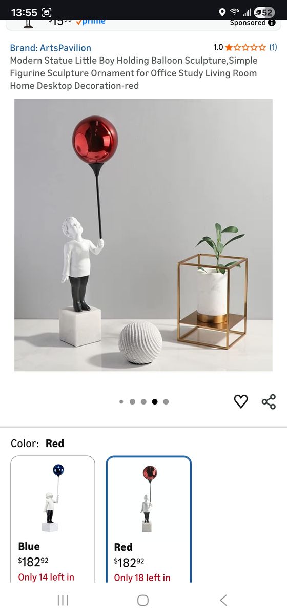 Boy with balloon statue