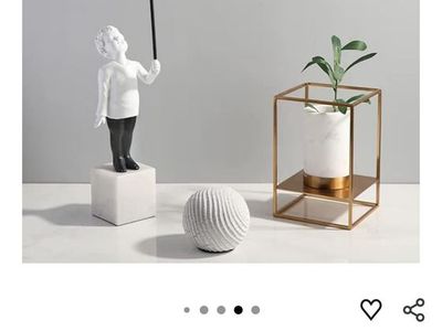 Boy with balloon statue