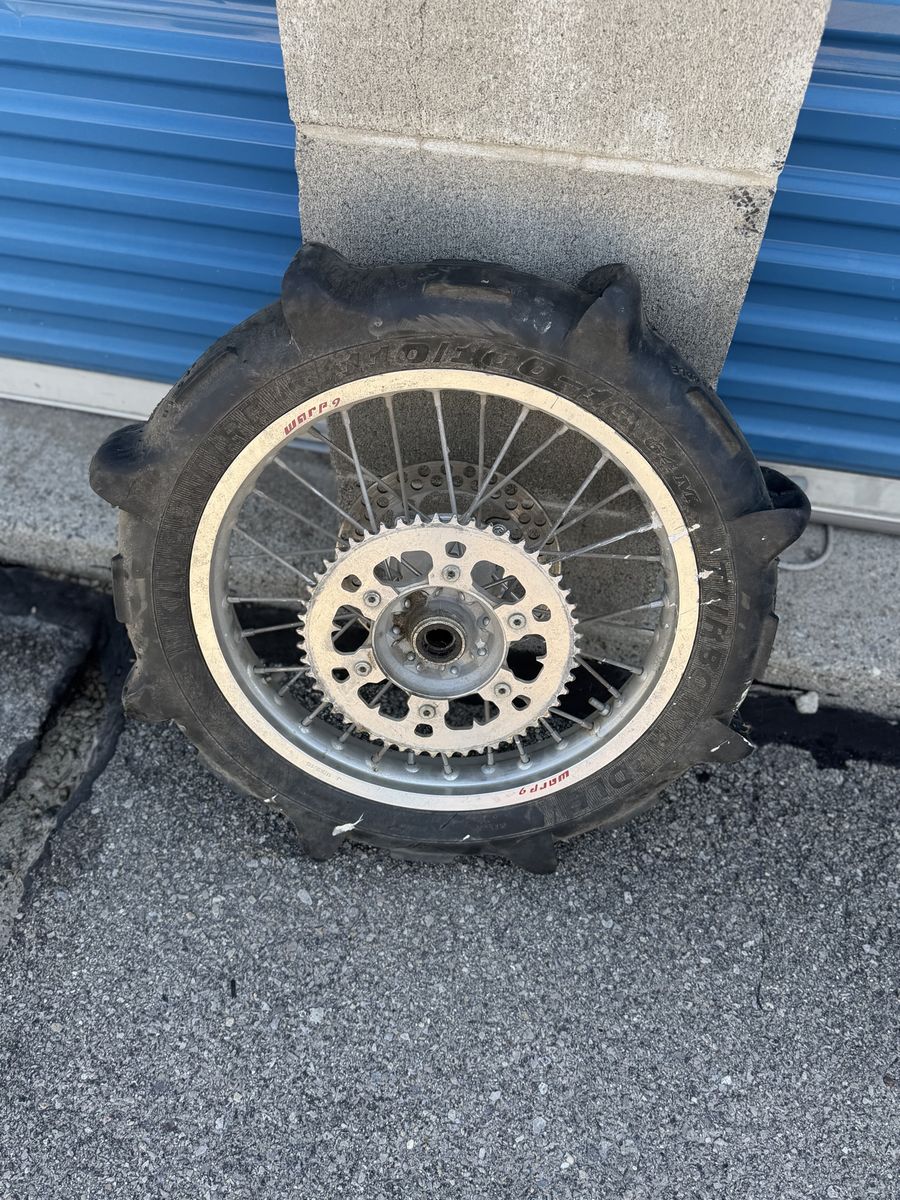 Honda Rear wheel with paddle tire
