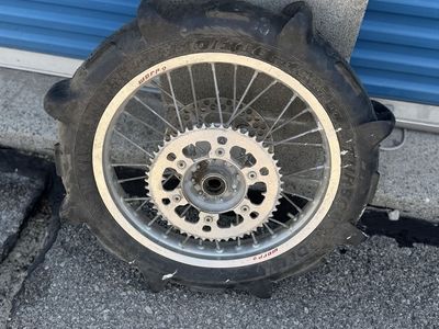 Honda Rear wheel with paddle tire