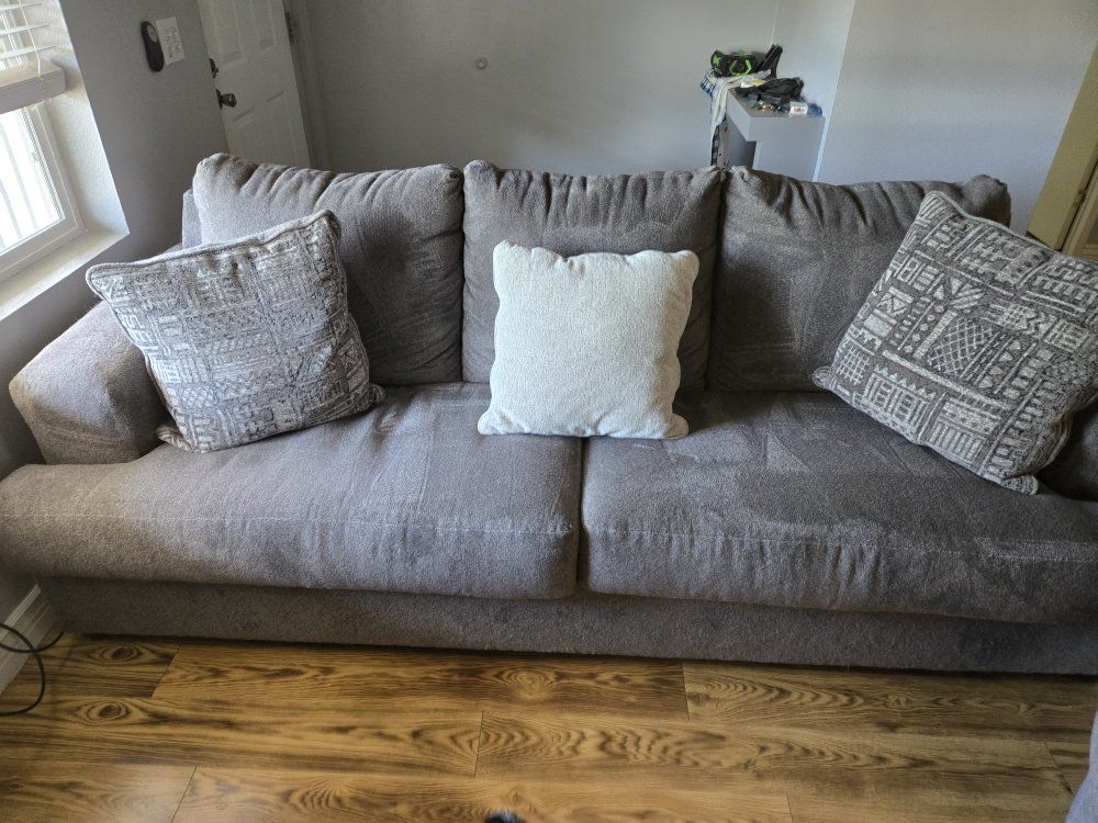 Cozy Gray Fabric Sofa & Swivel Chair Set with Throw Pillows.