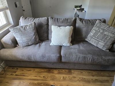 Cozy Gray Fabric Sofa & Swivel Chair Set with Throw Pillows.