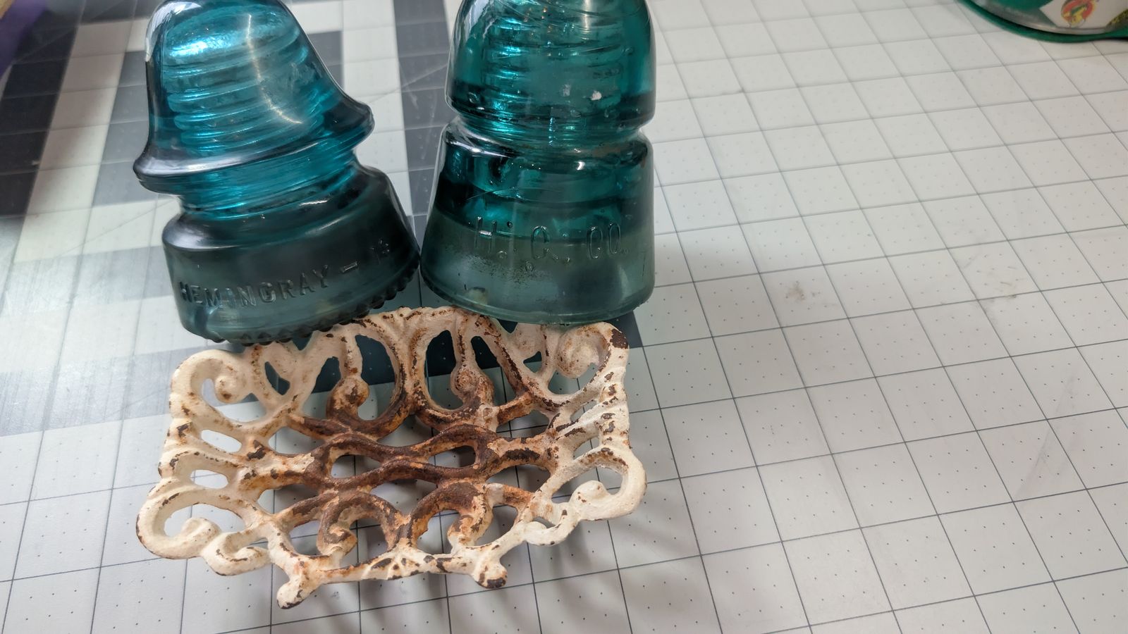 Antique soap dish and glass electric insulators