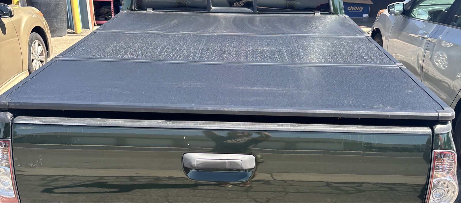 Hard Aluminum Tri-Fold Tonneau Cover with LED Lights – Fits 05-21 Nissan Frontier 6ft Bed