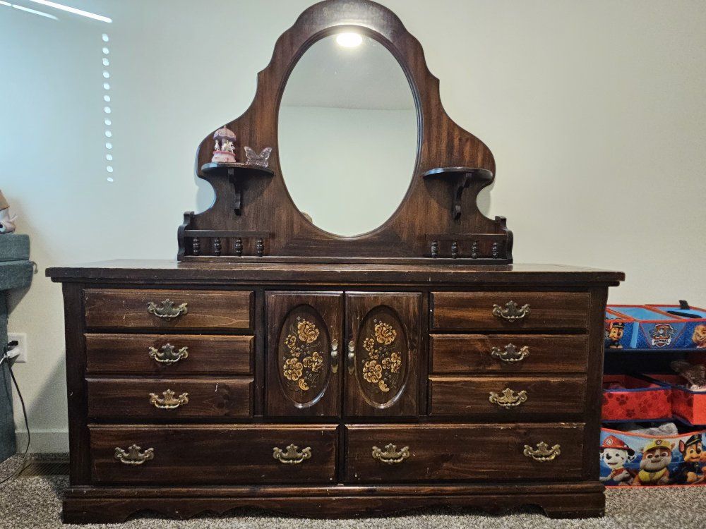 Vintage Wooden Dresser with Attached Mirror and Floral Carved Cabinet Doors