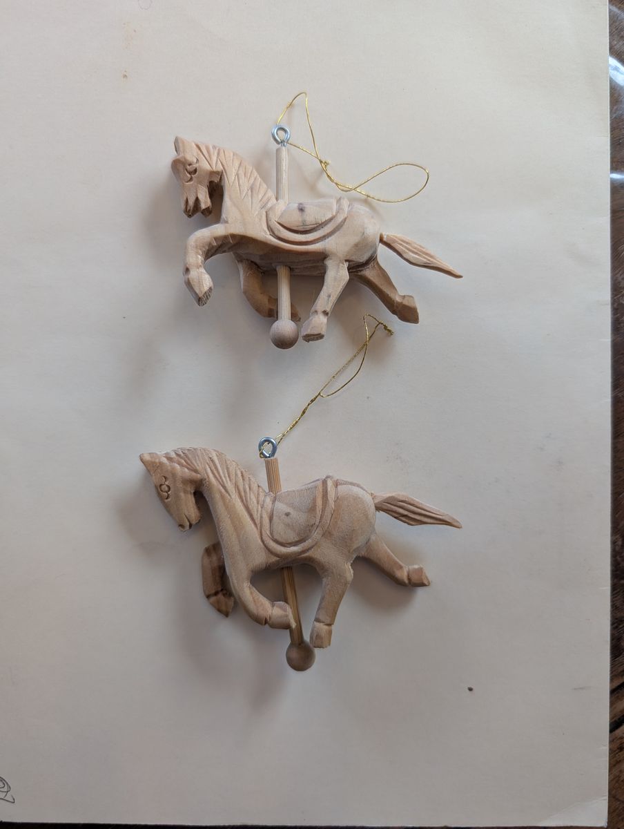 Hand carved wooden horse ornaments