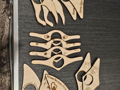 Assorted Wooden Page Holders, toothpaste rollers and dog poop sac holders