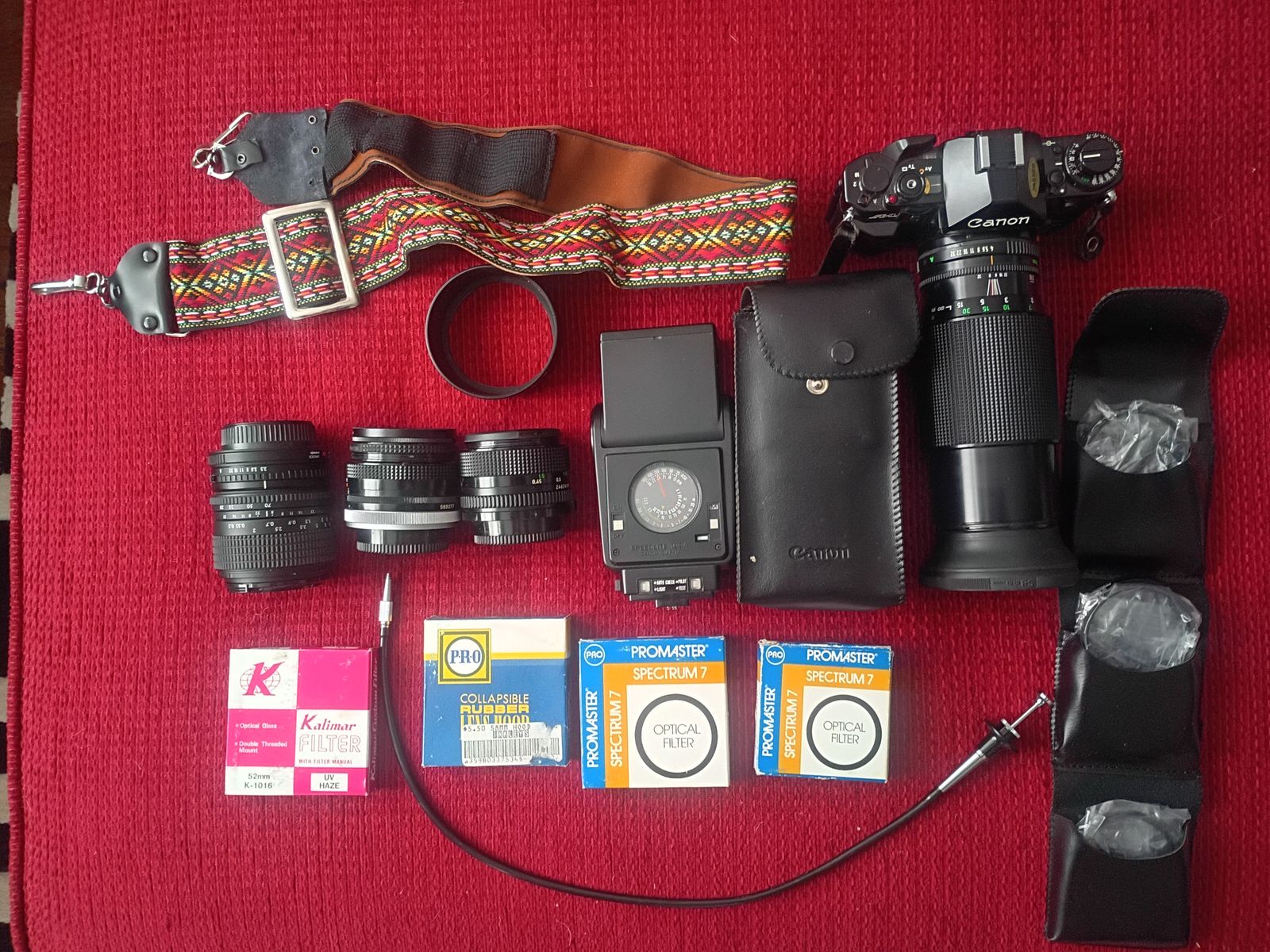 Canon A1 SLR outfit with lenses and flash