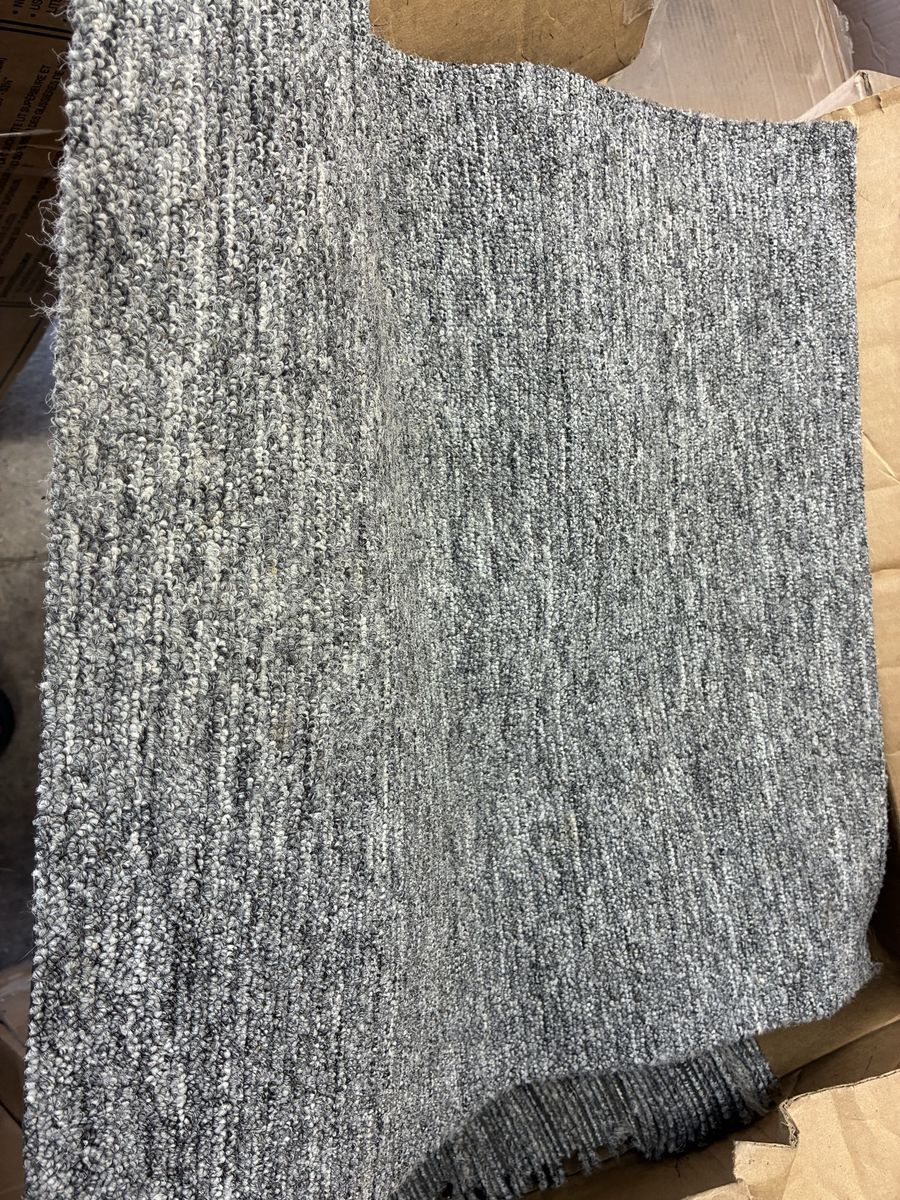 18x18 carpet squares new, about 75 of them
