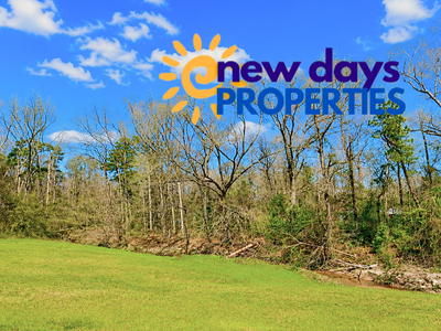 0.31 Acres with Highway Frontage & a Peaceful Creek!