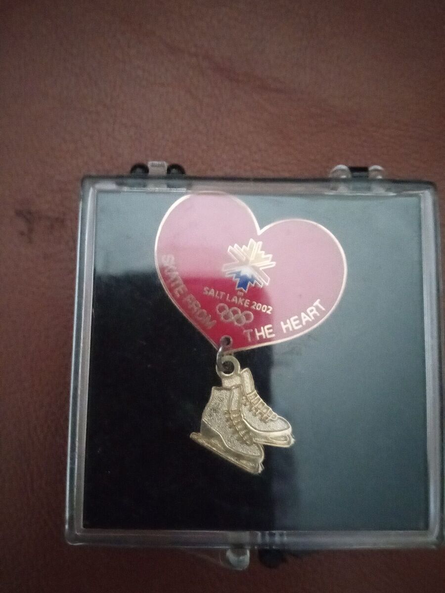 Olympic pin figure skates skate from the heart