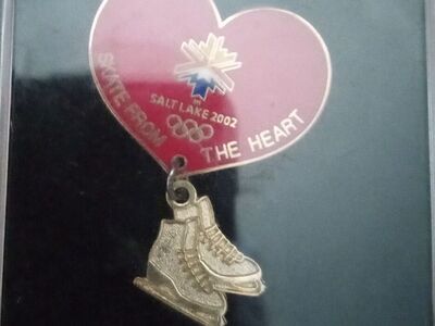 Olympic pin figure skates skate from the heart