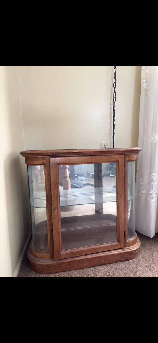Vintage, low profile half round curio cabinet