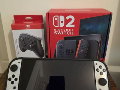 Switch 2 with pro controller and dbrand grips and case