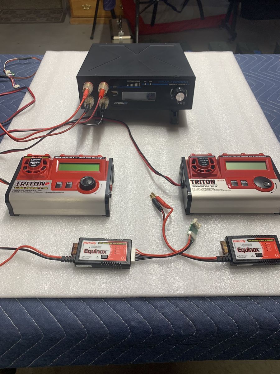 Two Battery chargers:  1- 12 to 24 Volt power supply
