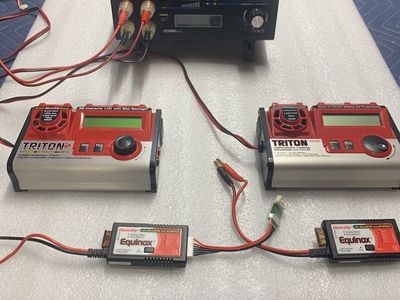 Two Battery chargers: 1- 12 to 24 Volt power supply