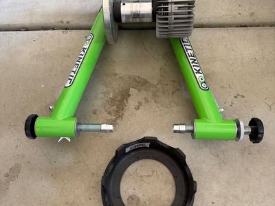 Kinetic T-699C Fluid Bike Trainer + CycleOps Front Wheel Riser