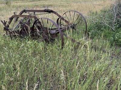 Antique hay rakes