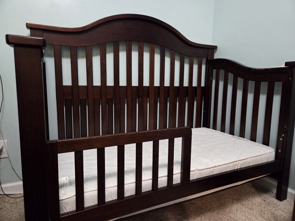 Dark wood Crib