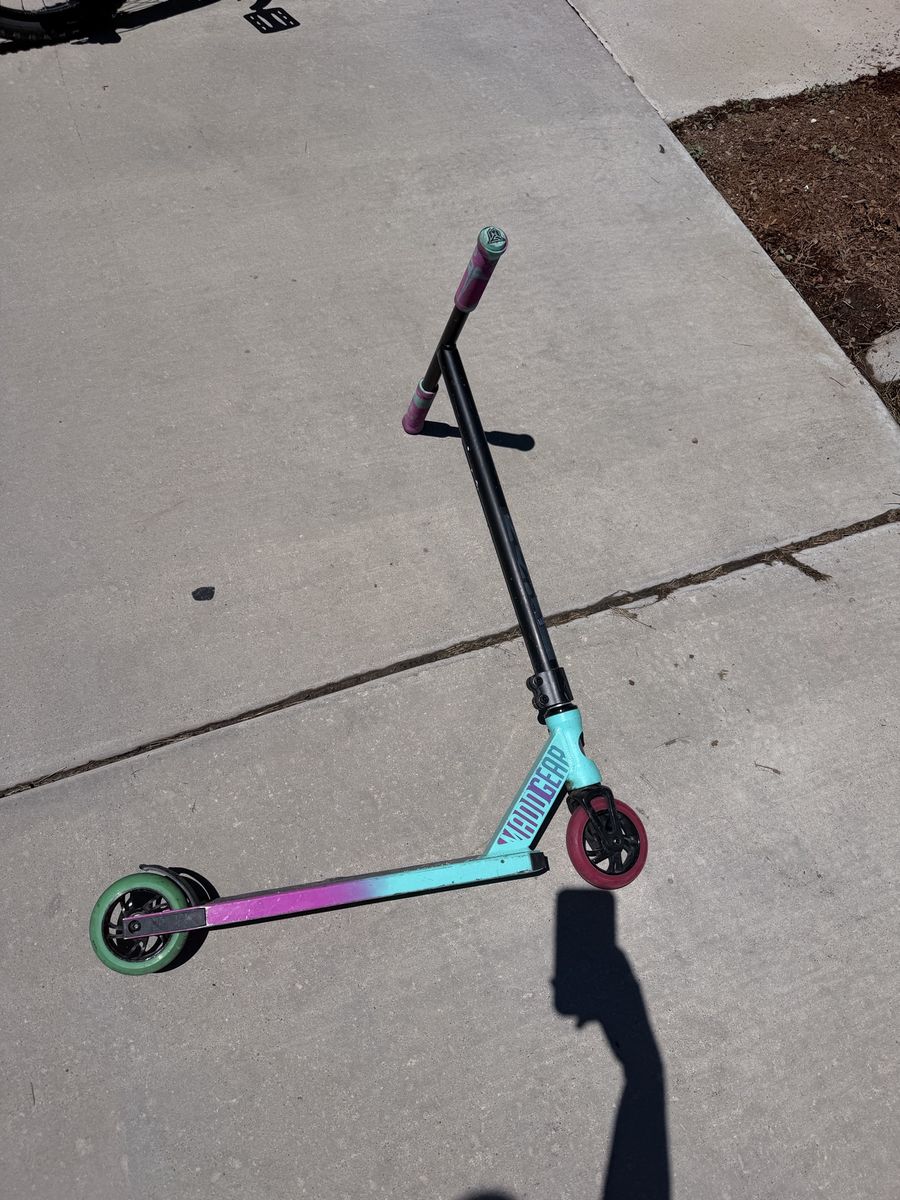 Madd Gear Pro Scooter - Teal, Purple & Black Stunt Scooter with Red & Green Wheels