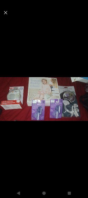 Unopened Baby Essentials Lot: Sound Machine, Travel Potty, Car Seat Mirror, & Outlet Covers