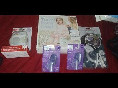 Unopened Baby Essentials Lot: Sound Machine, Travel Potty, Car Seat Mirror, & Outlet Covers