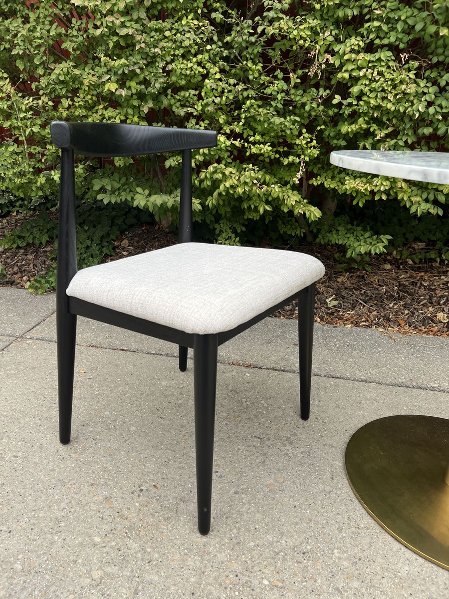 Round Marble Top Cafe Table with Brass Base and Black Accent Chair