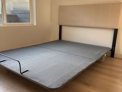 Queen Size Adjustable Bed Base with Beige Upholstered Headboard