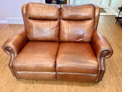 Two Genuine Leather Reclining Loveseats – Good Condition - Must be sold as a set