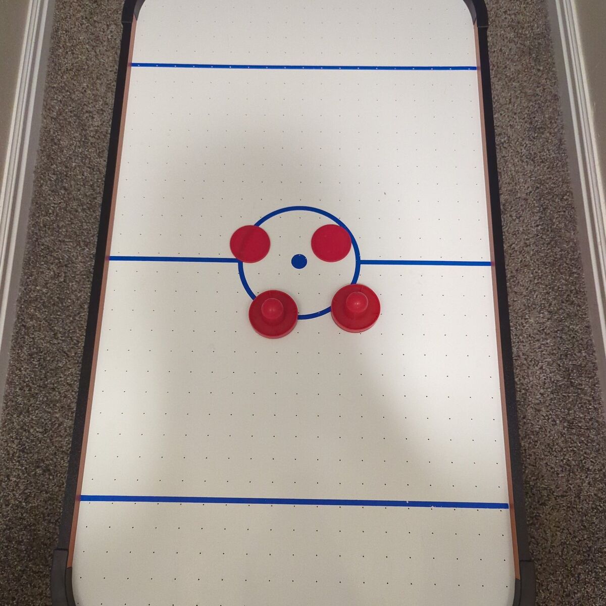 Miniature air hockey table