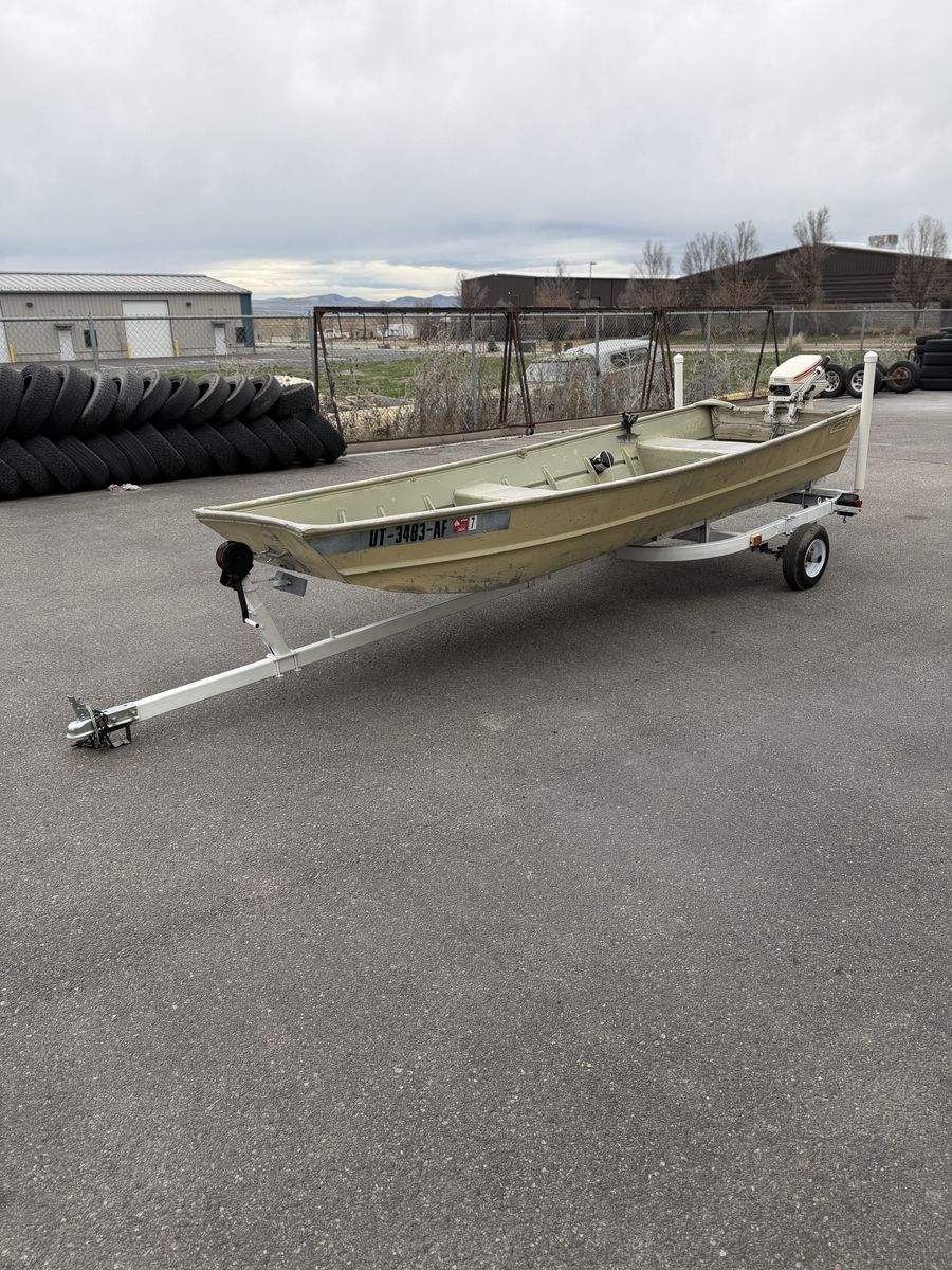 Fishing Boat with Motor and Trailer