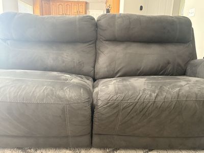 Gray Dual Reclining Sofa and Loveseat with Nailhead Trim