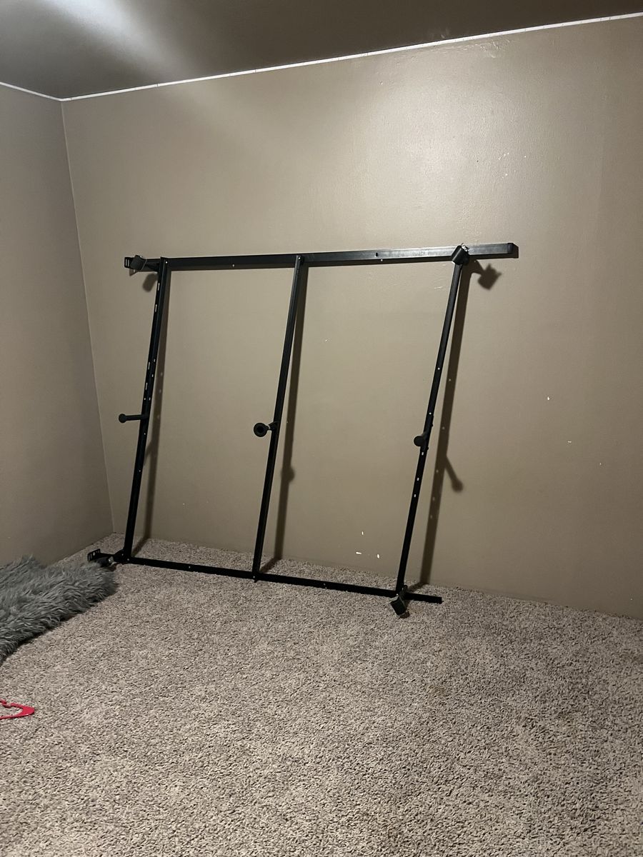 Black metal queen bed frame