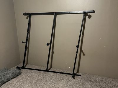 Black metal queen bed frame