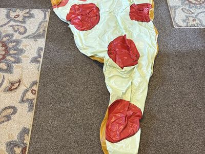 Giant Inflatable Slice of Pizza for water recreation, pool, lake, waterpark.