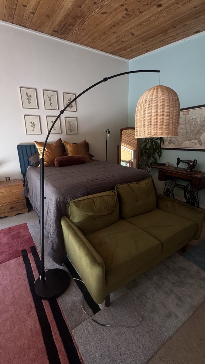 Black Metal Arc Floor Lamp with Woven Rattan Shade
