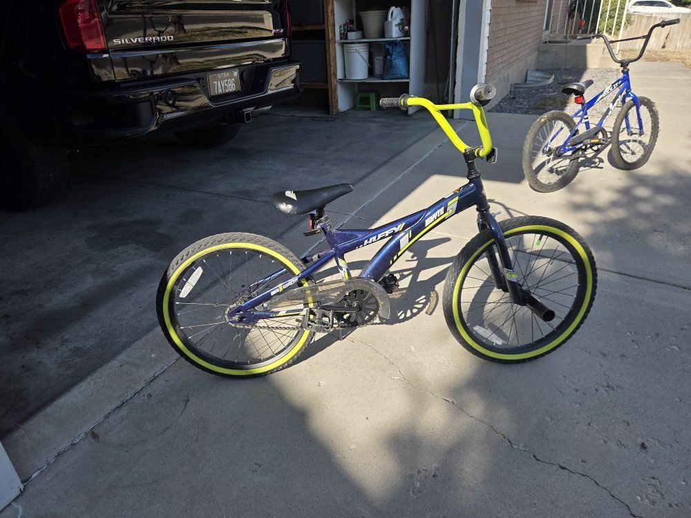 Huffy Rock It Blue Kids' BMX Bike with Neon Yellow Accents