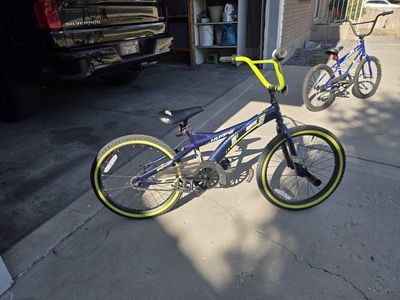 Huffy Rock It Blue Kids' BMX Bike with Neon Yellow Accents