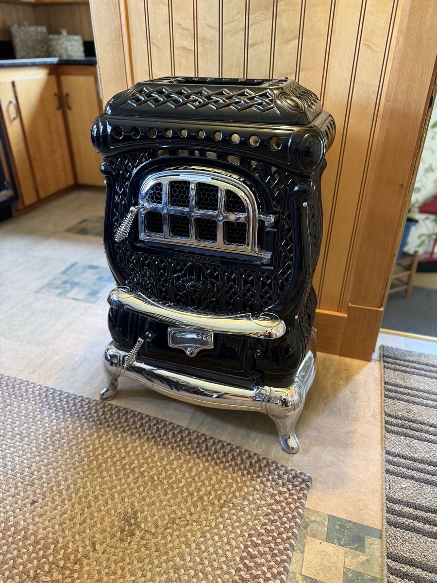Vintage Coal Stove. Restored as a quality vintage item to give your space charm. Not usable to burn fires it’s just for looks.